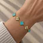 PULSERA ELITE DORADA - FUCSIA