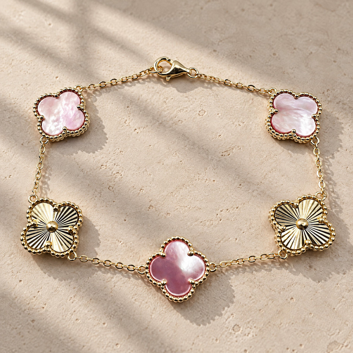 PULSERA ELITE DORADA - ROSA