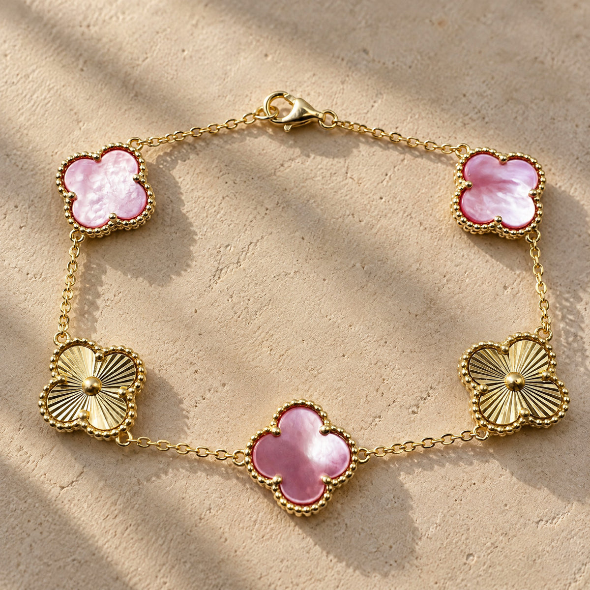 PULSERA ELITE DORADA - ROSA